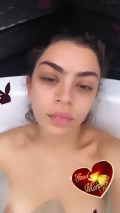 Charli XCX nude in boob flash