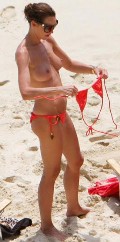 Tamara Mellon nude in Topless sunbathing