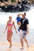 Tori Spelling in pink bikini