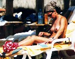 Adeline Blondieau nude in Topless sunbathing