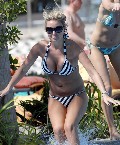 Alex Curran in bikini by the pool