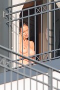 Anna Wendzikowska nude in nude on a balcony