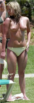 Brooke Kinsella nude in Topless sunbathing