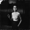 Ariane nude in topless photoshoot