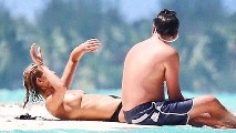 Toni Garrn nude in Paparazzi