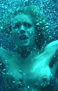 Rebecca Romijn nude in Femme Fatale