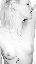 Dorith Mous nude in topless photoshoot