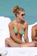 Julie Henderson in green bikini