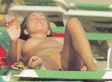 Laura Manzanedo nude in Topless sunbathing