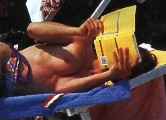 Manuela Di Centa nude in Topless sunbathing