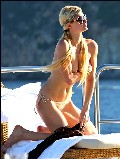 Paris Hilton nude in Topless sunbathing