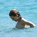 Vanessa Paradis nude in Topless swimming