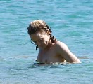 Vanessa Paradis nude in Topless swimming