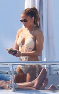 526x768, 70 KB, Jennifer_Lopez_in_a_crochet_swimsuit_aboard_a_yacht_In_France_-01.jpg