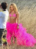 149x200, 26 KB, Shakira_pictured_in_a_pink_skirt_and_bikini_top_during_a_sexy_photoshoot_in_Ibiza.jpg