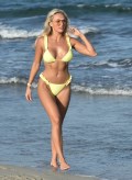 876x768, 90 KB, Amber_Turner__on_the_beach_in_Crete.jpg