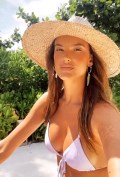 338x500, 67 KB, Alessandra_Ambrosio_rides_a_bike_in_a_bikini_top.gif